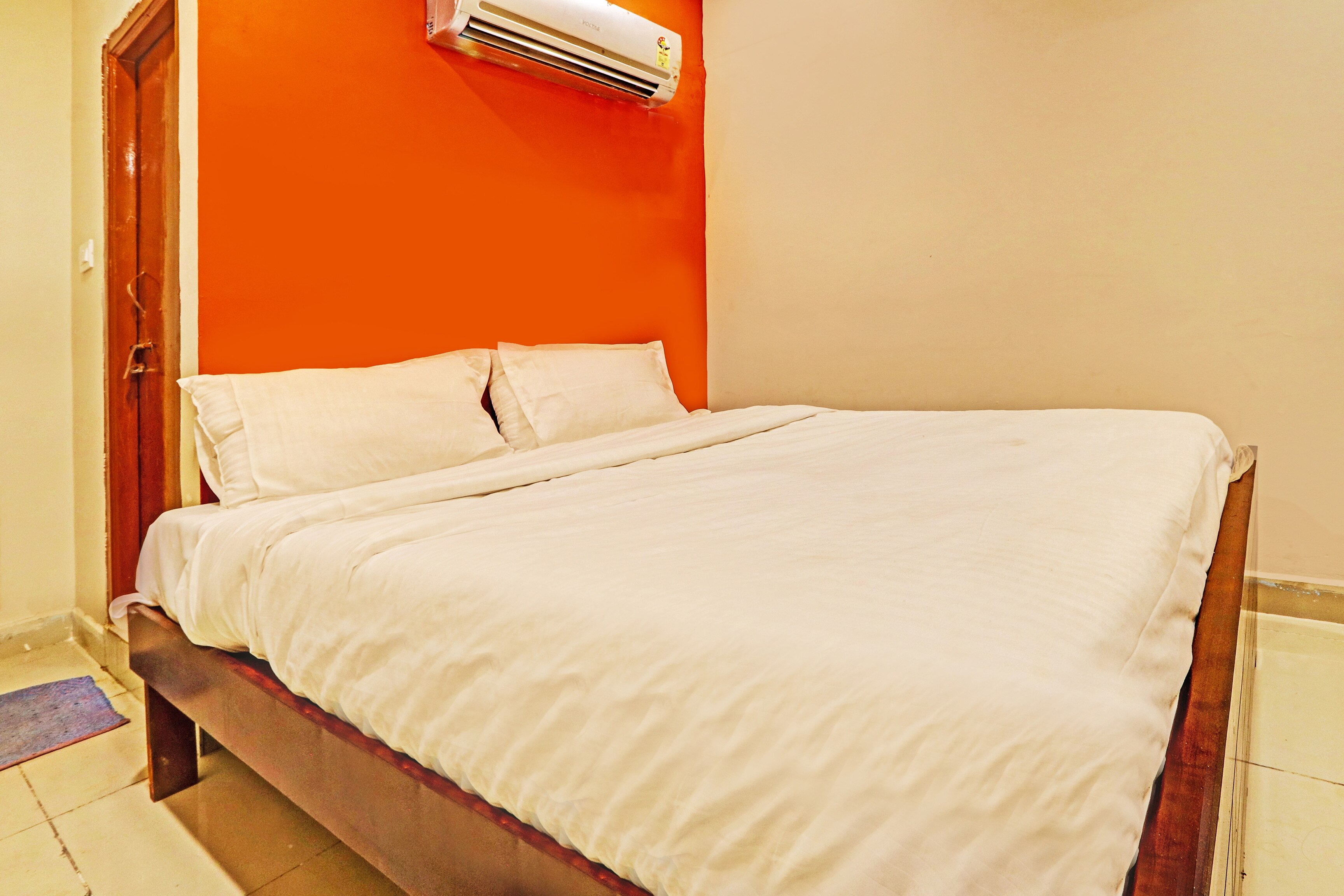 Super Hotel O Sriman Stay Inn - Tap to explore photos