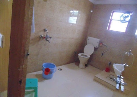 R k Paying Guest house - Tap to explore photos