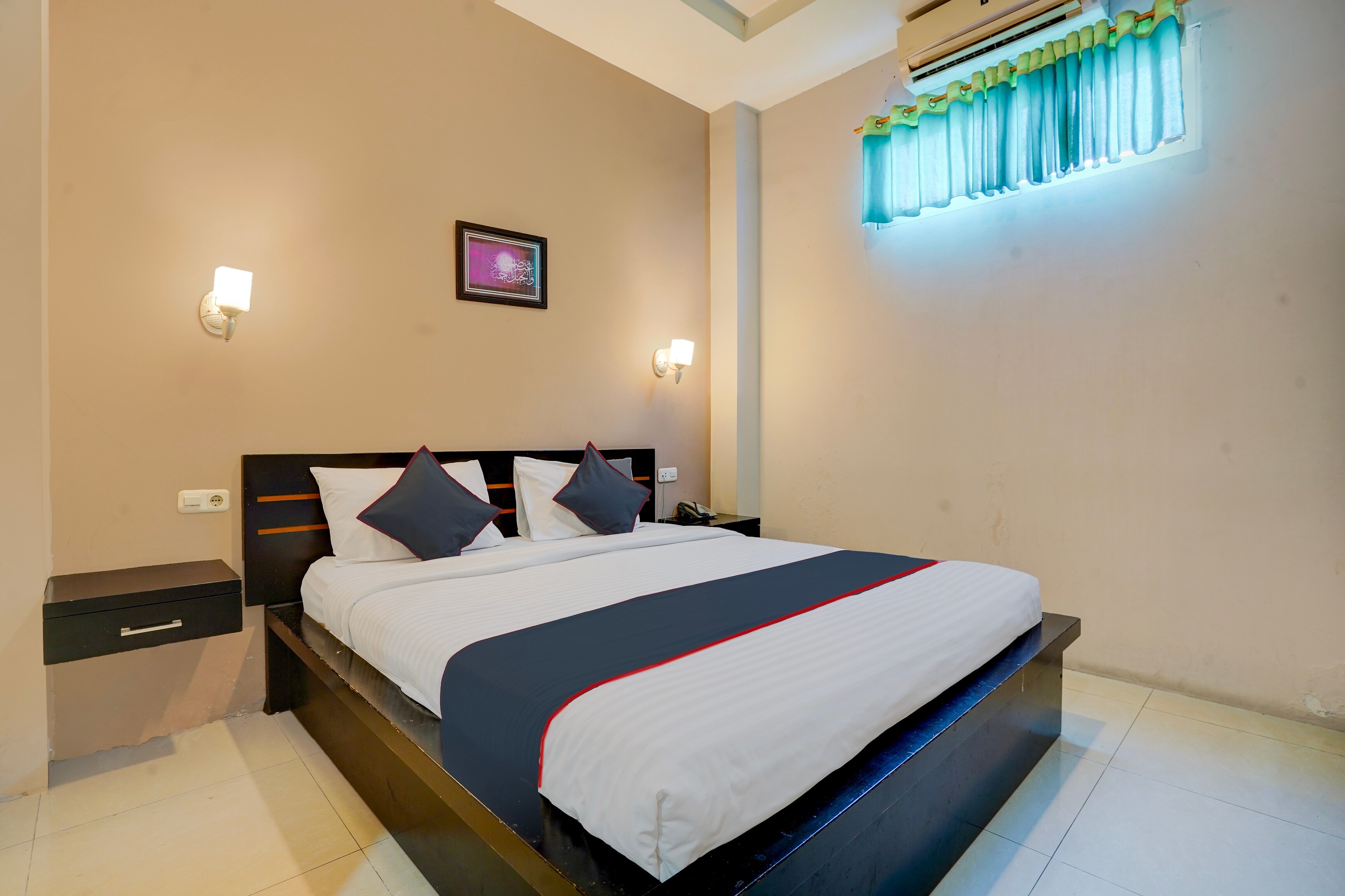 Capital O 94619 Bunda Hotel - Tap to explore photos