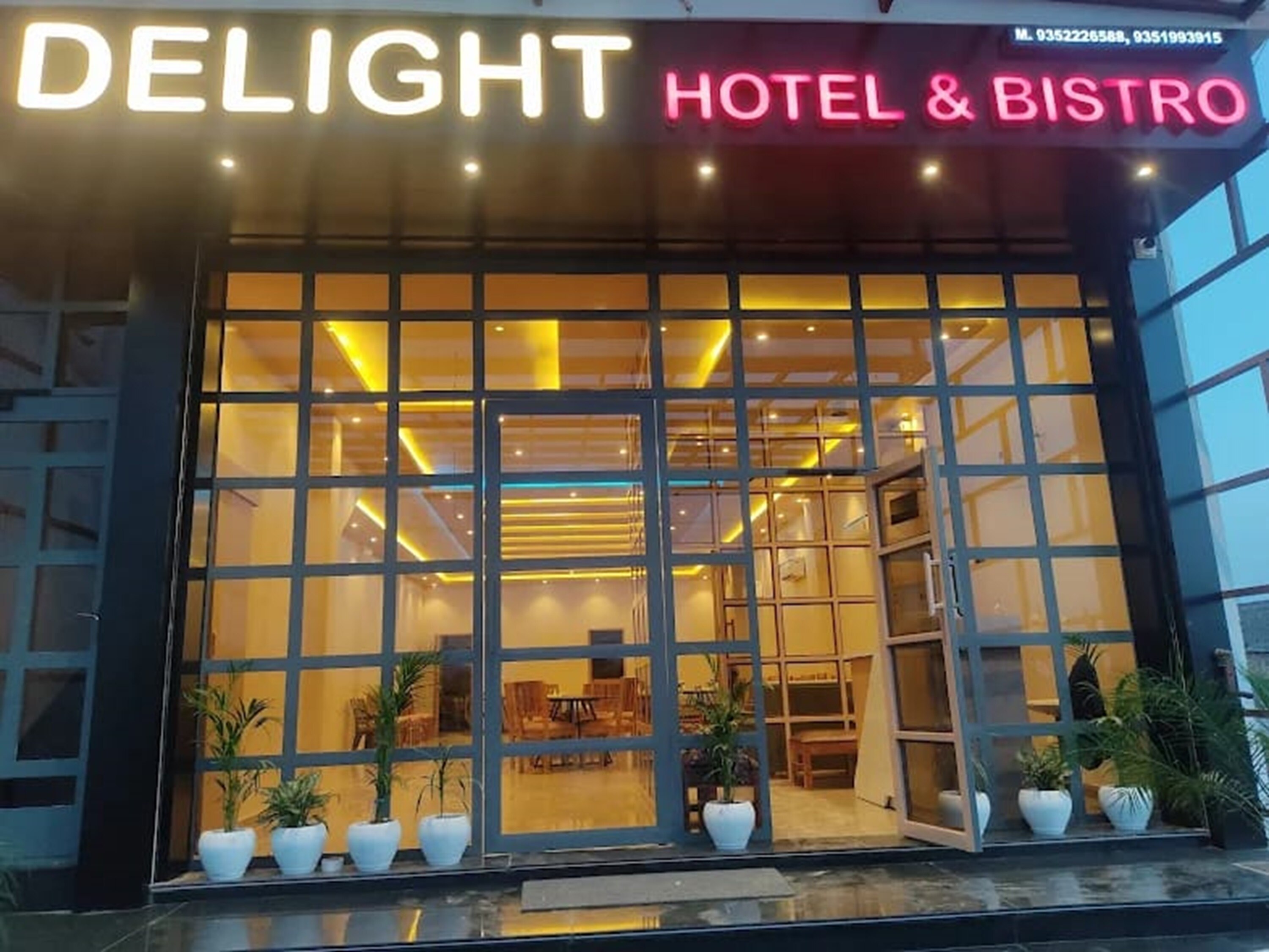 HOTEL DELIGHT AND BISTRO - Tap to explore photos