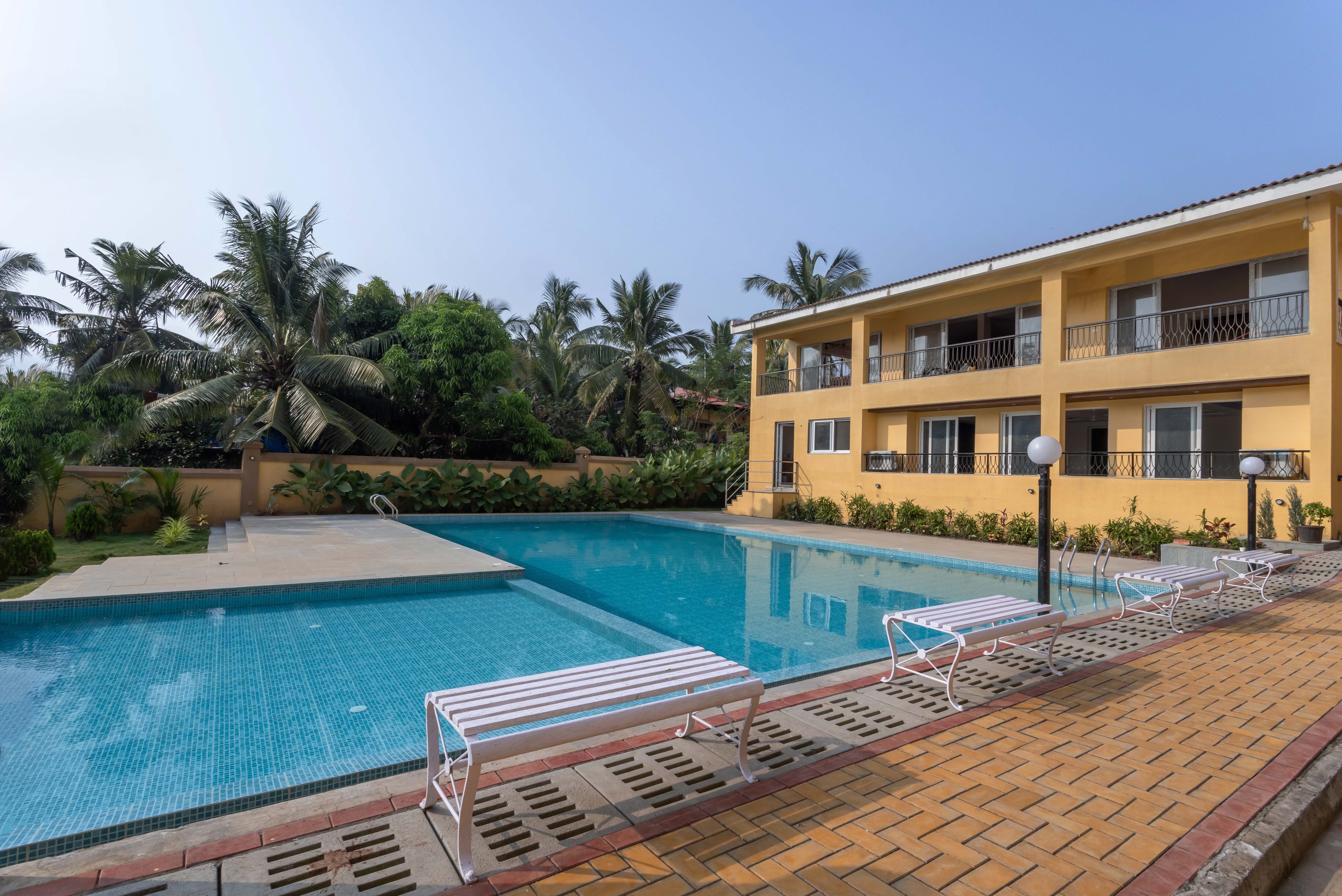 tisyastays | The Pearl 1BHK Apartment - Tap to explore photos