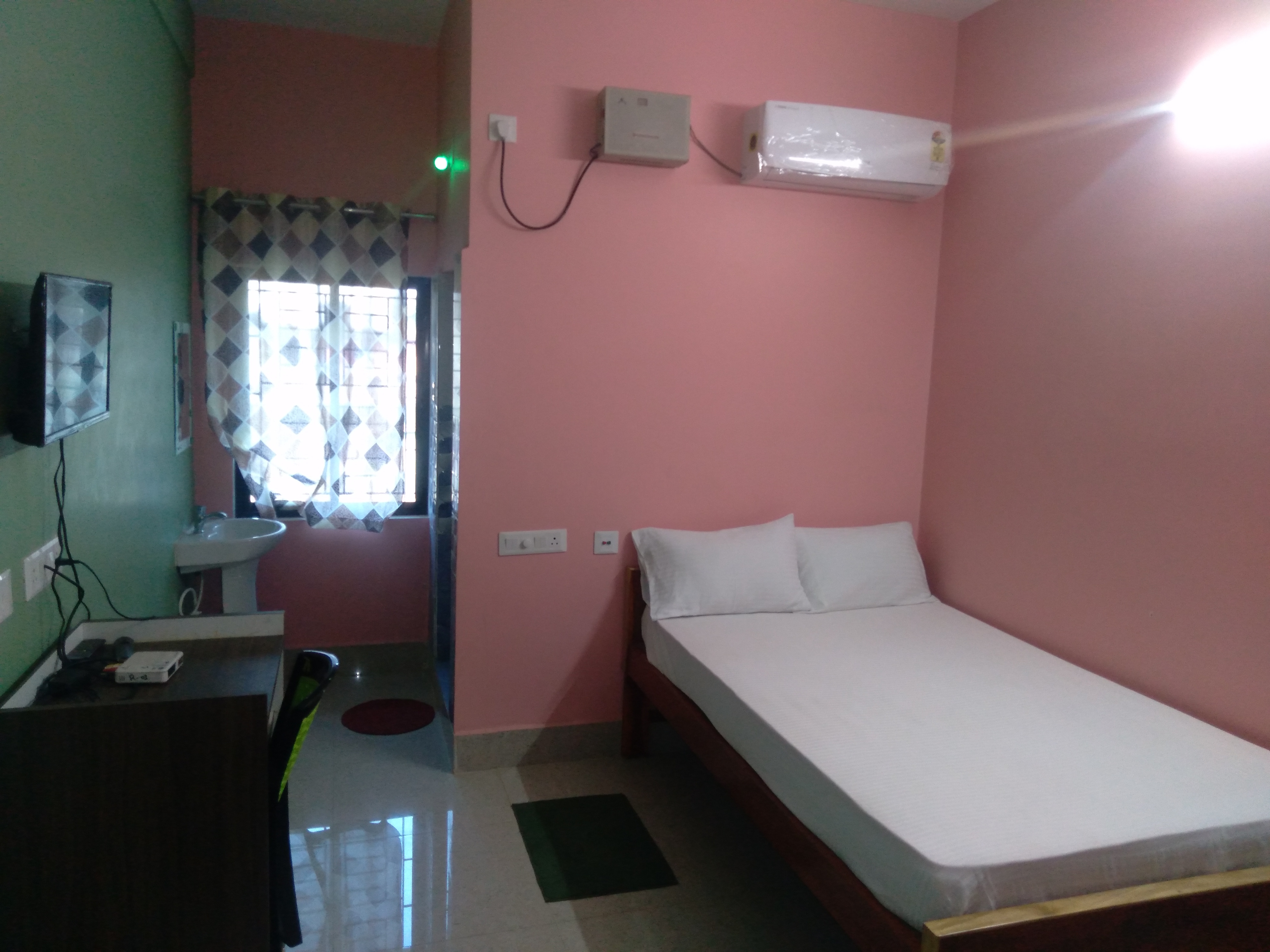 Hotel Indradhanu - Tap to explore photos