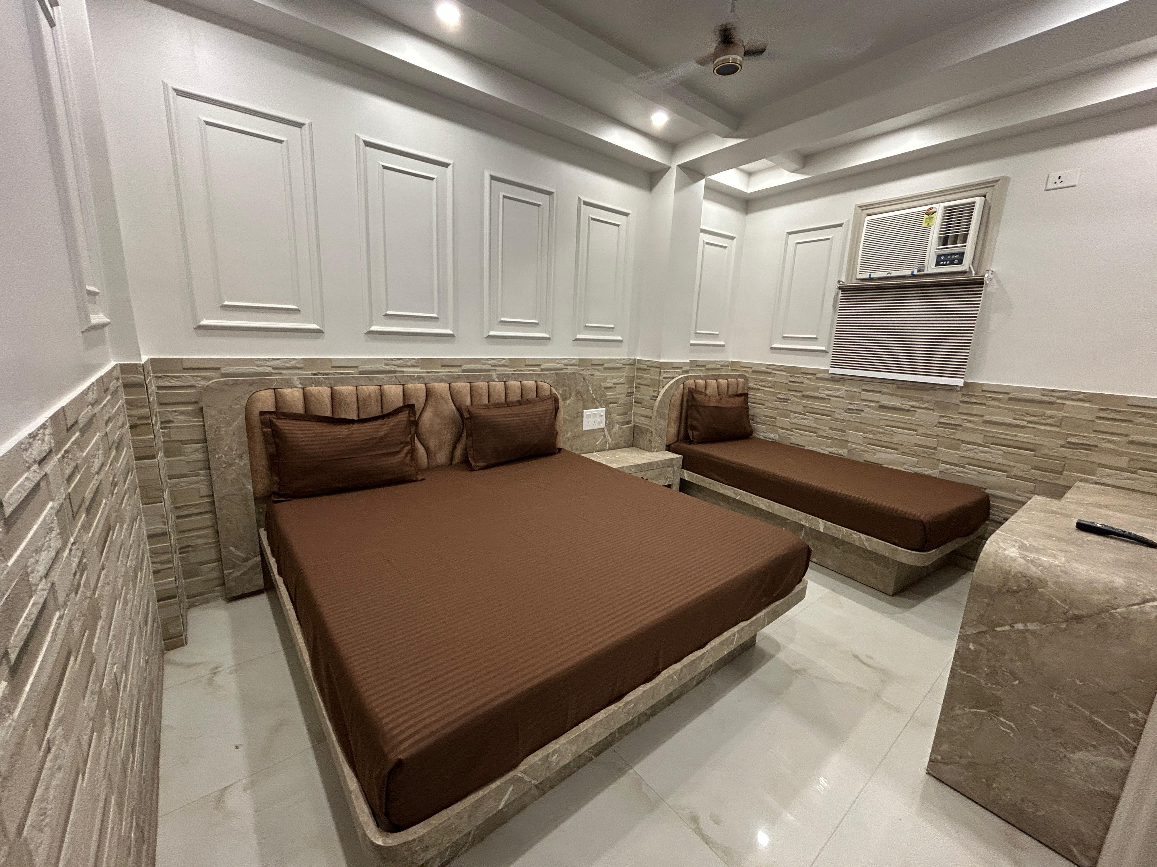 Hotel Shree Guru - Tap to explore photos