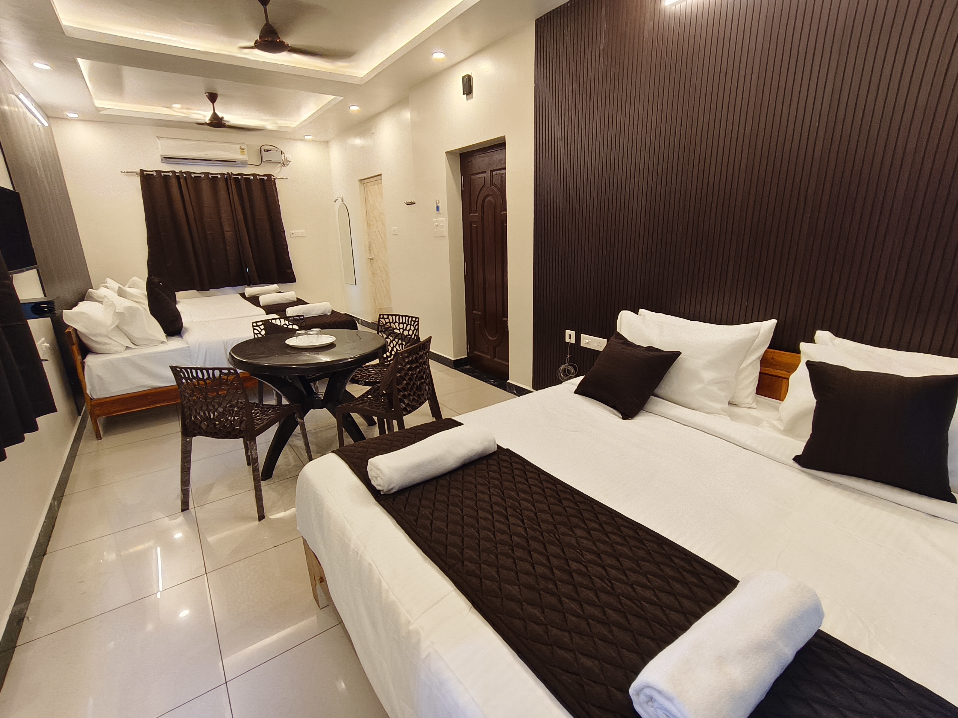Sai RBM Grand Inn - Tap to explore photos