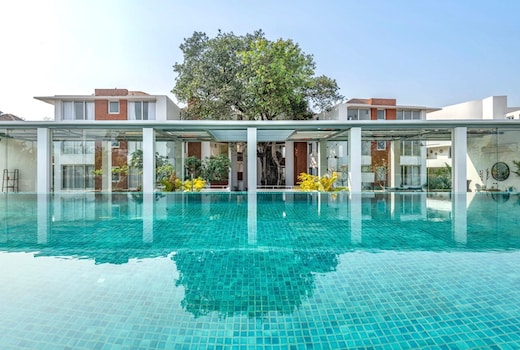 Modern 2BHK w Pool Access | 5km to Coco Beach | Hireavilla