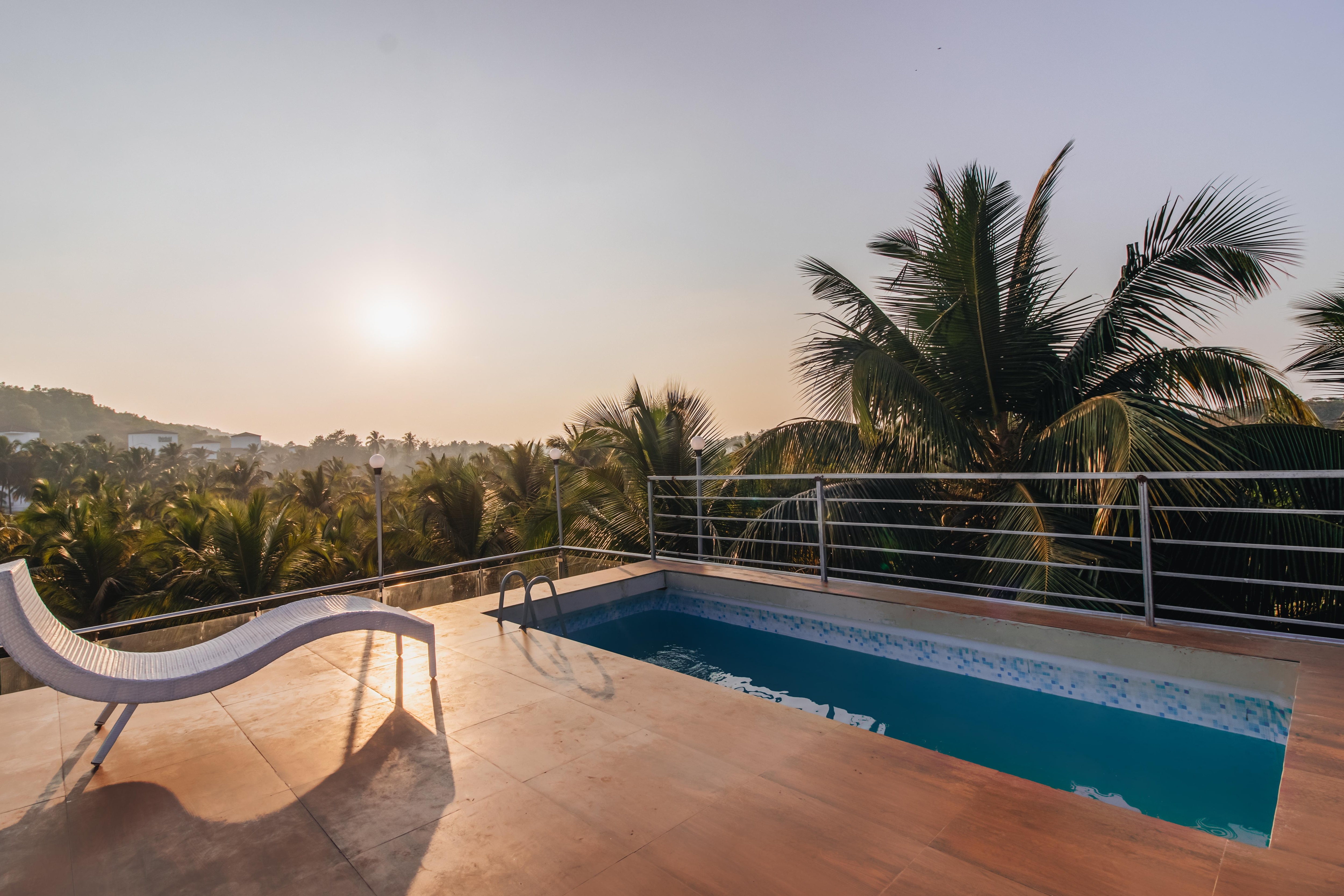 Lavish 4BHK Villa with Pool Lake and Hill View - Tap to explore photos