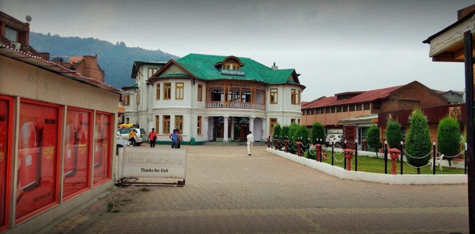 Hotel Malik Palace - Tap to explore photos
