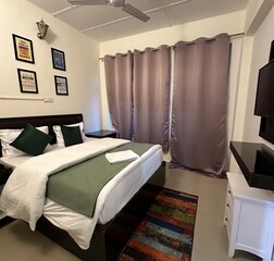 Deluxe Room with Private Balcony and mountain view
