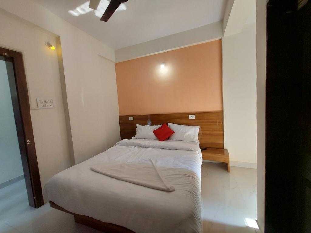 Hotel O Crystal Executive - Tap to explore photos