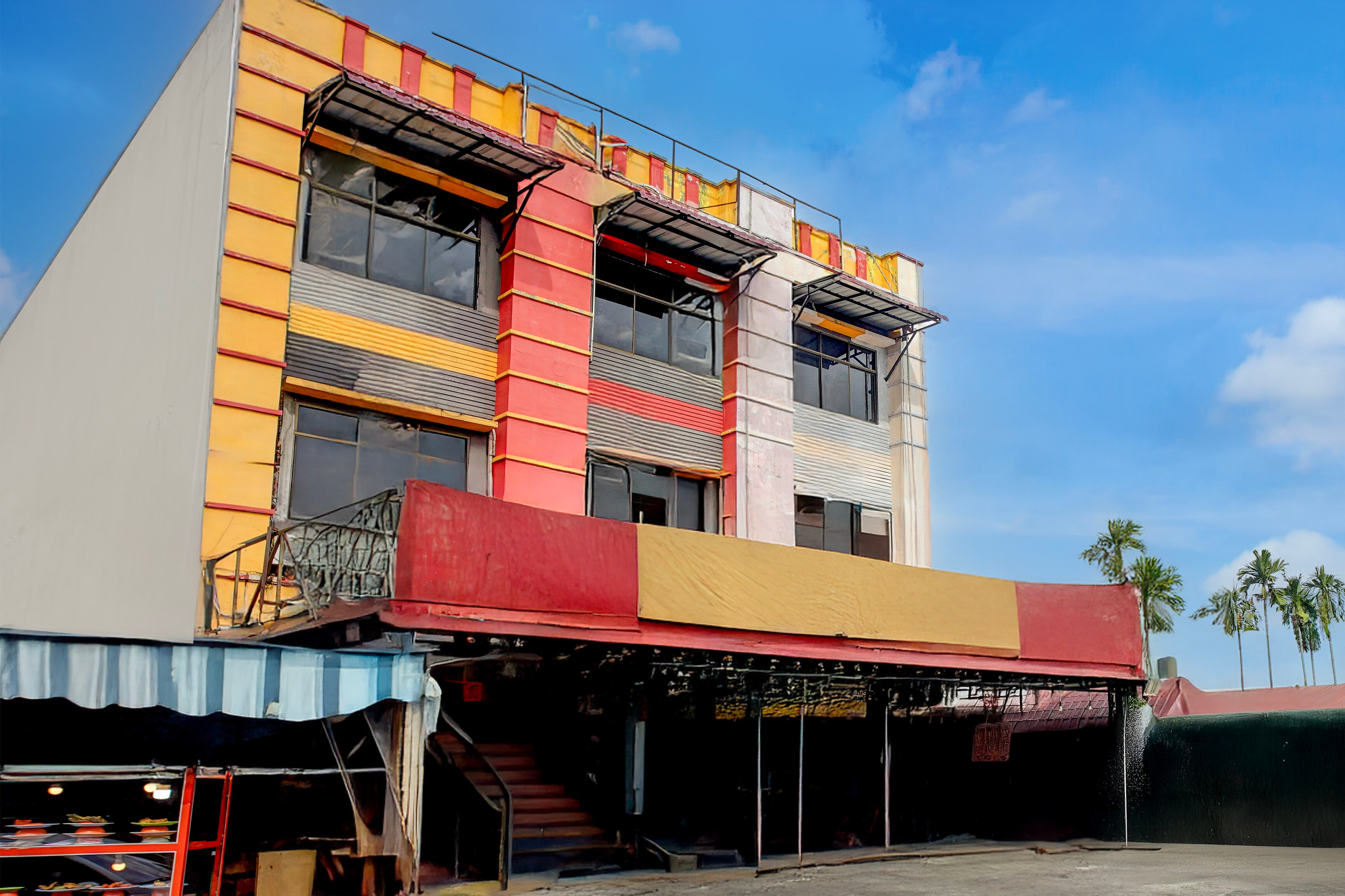 OYO 94581 Surya Residence Medan - Tap to explore photos