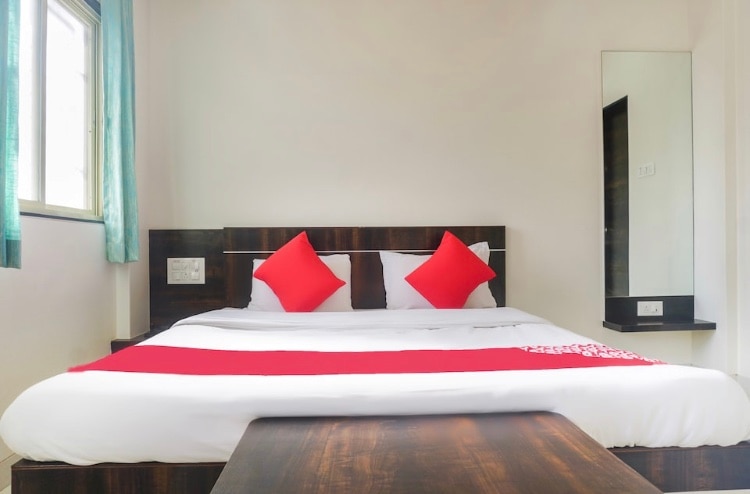 Hotel Anand Executive - Tap to explore photos
