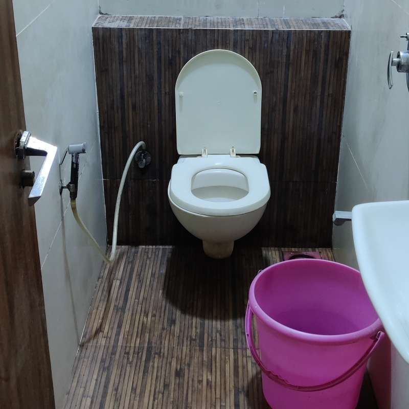 ZipStay Shreya Lodging - Tap to explore photos