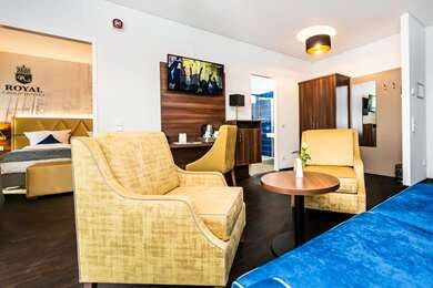 Best Western Plus Royal Suites - Tap to explore photos