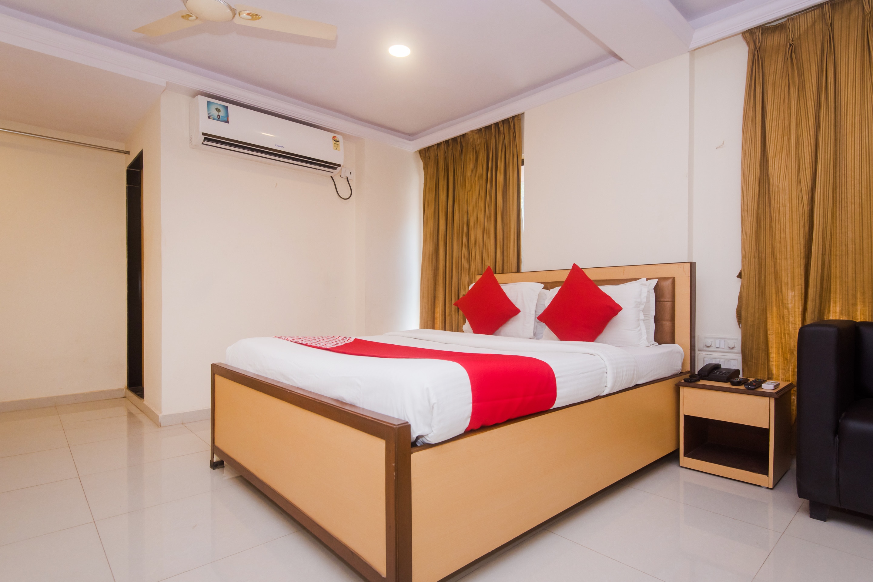 Capital O Orbit Inn Near Infiniti Mall - Tap to explore photos