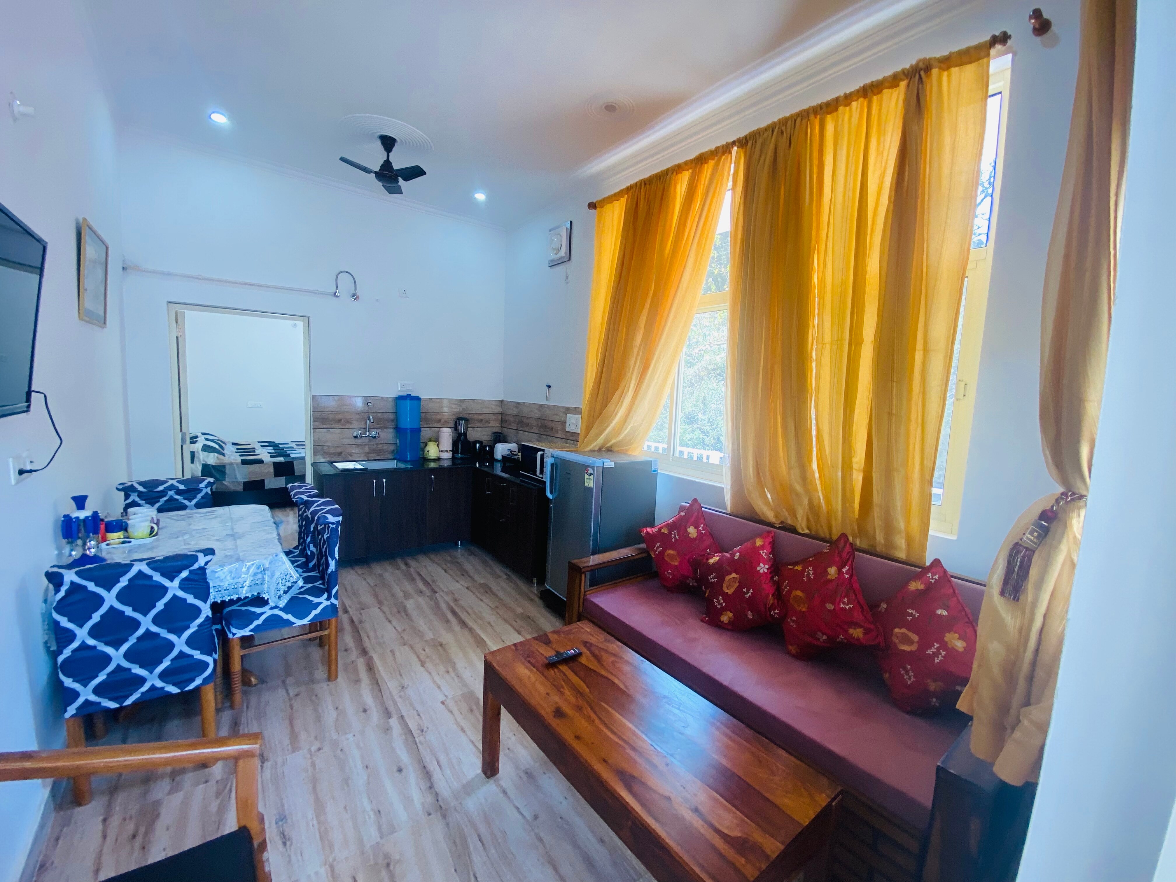 Athira Suite Naukuchiatal - Tap to explore photos