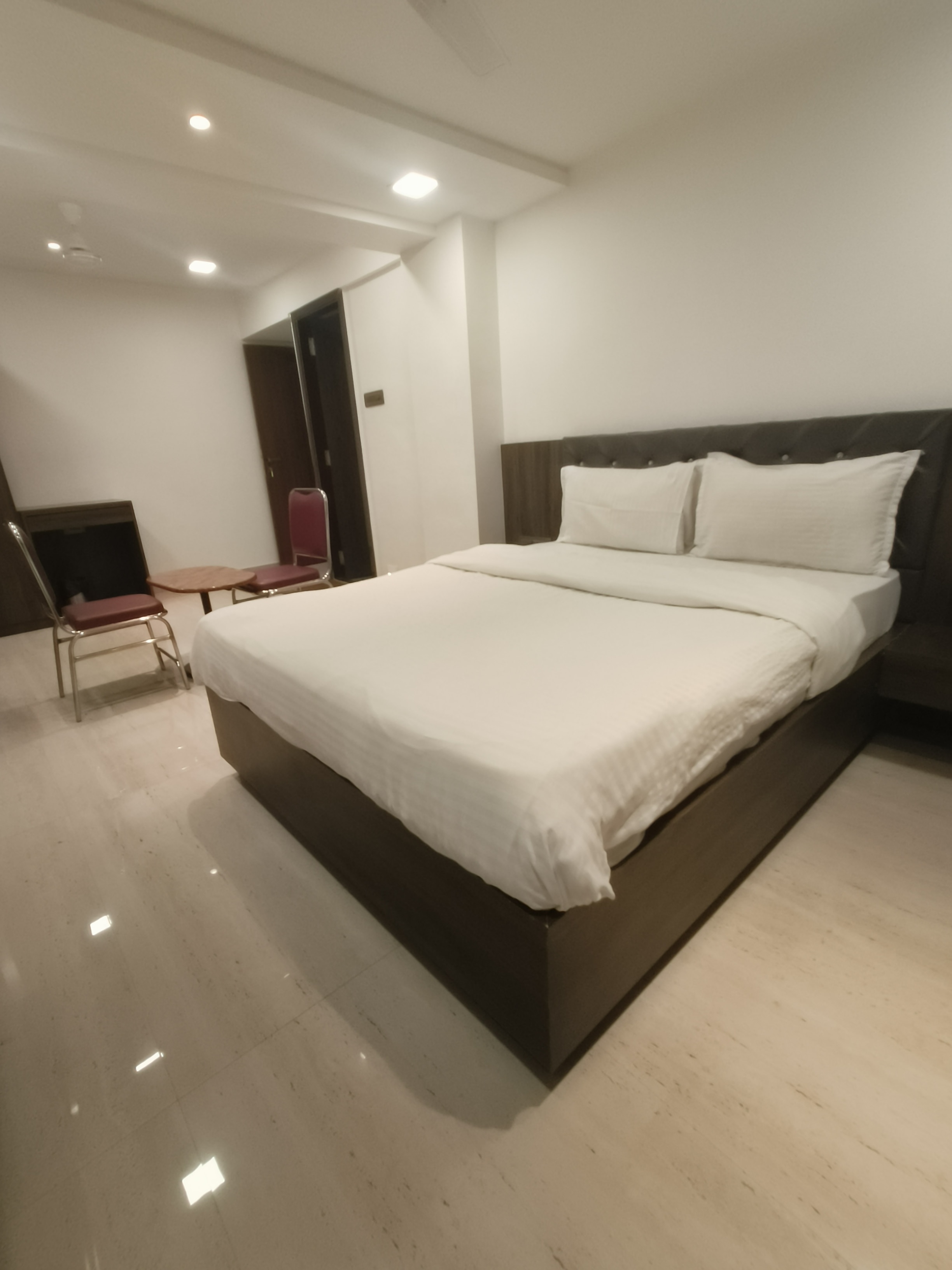 Hotel Sharada International - Tap to explore photos