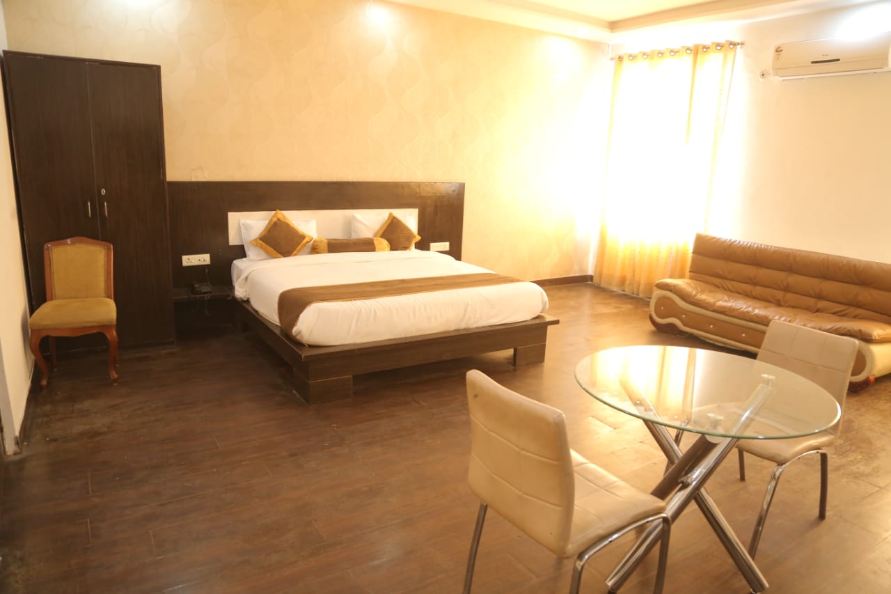 Hotel City Square & suites - Tajganj - Tap to explore photos
