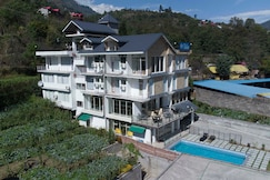 Gezellig Inn - Hotel Oasis Manali, Kasol