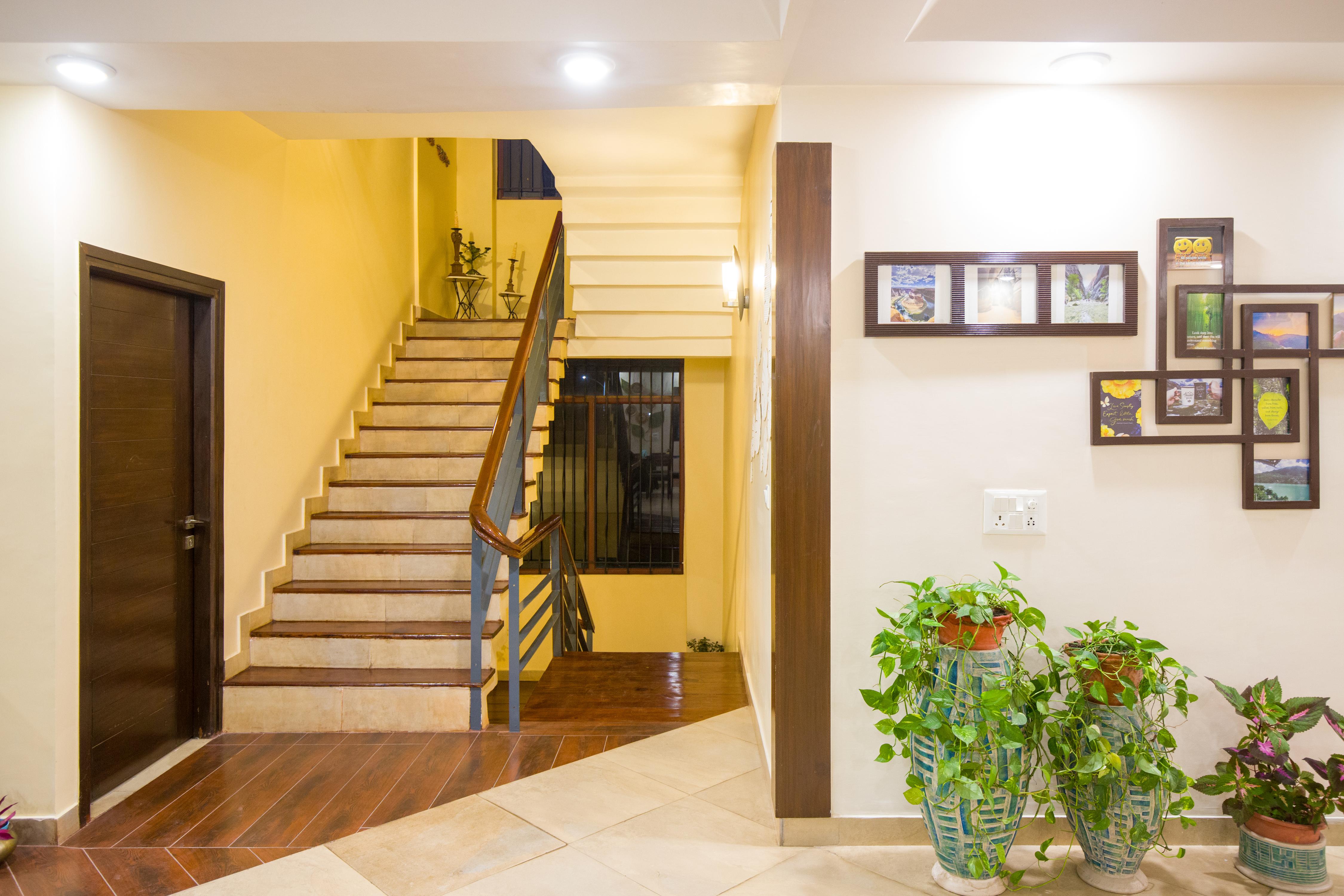 ELIVAAS 4 BHK Villa with Garden & Balconies |Lakeview Manor - Tap to explore photos