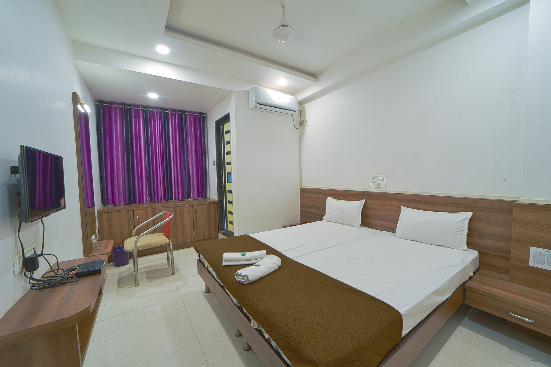 Hotel Radhika Deluxe - Tap to explore photos
