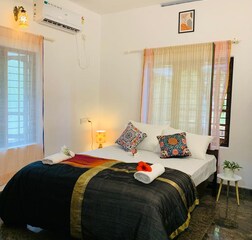 Deluxe AC Orchid Room