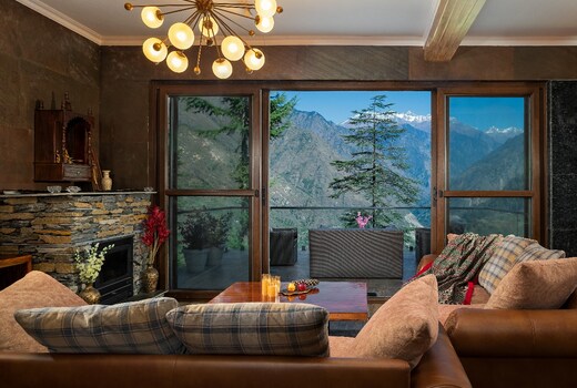 SaffronStays Hillstation over Tirthan Valley