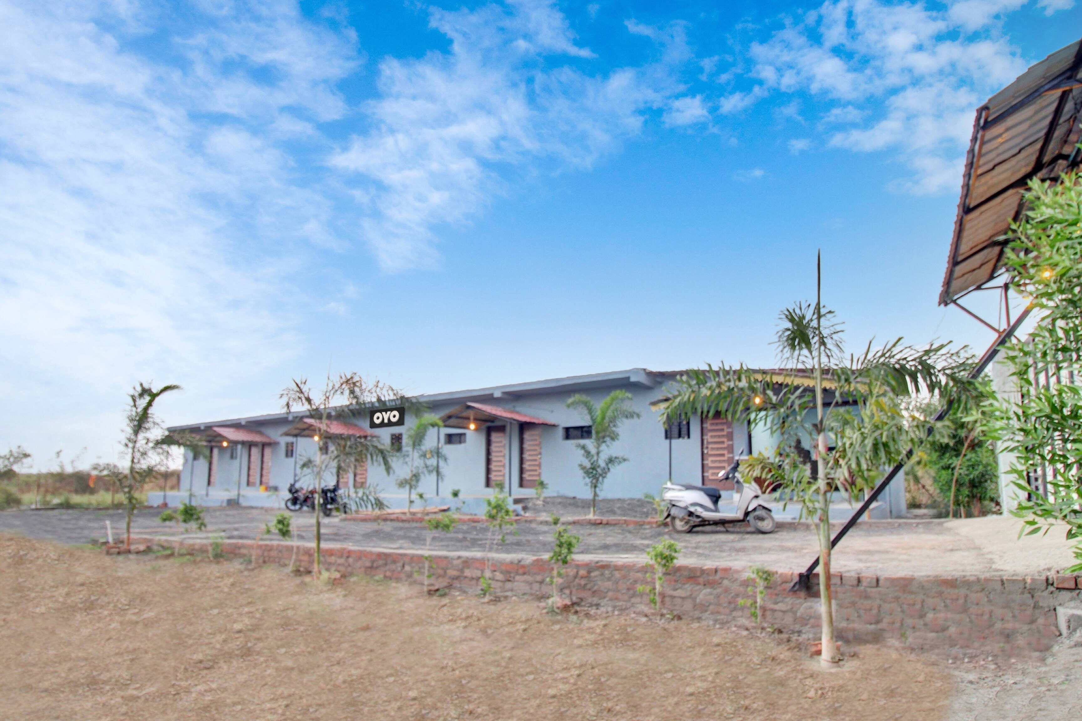 Hotel O The Village Resort - Tap to explore photos