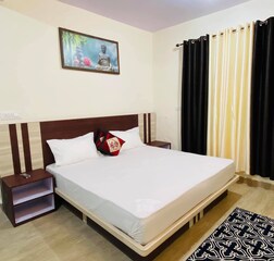 Garden-facing Queen Room