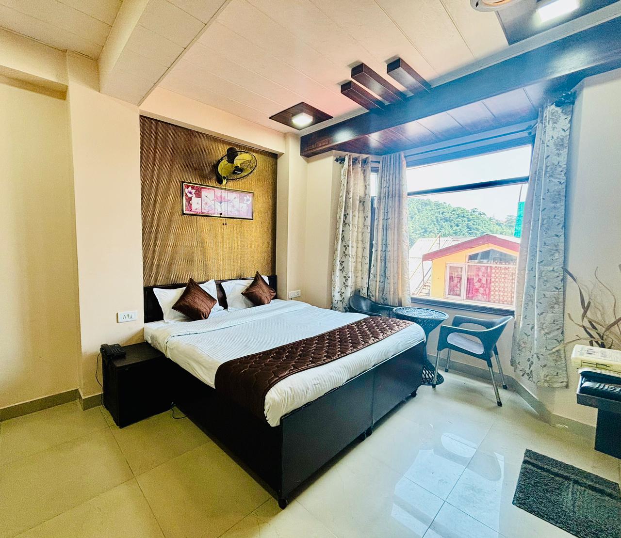 Kanlog Stay by Lazygetaways | Rooms & Wi-fi - Tap to explore photos