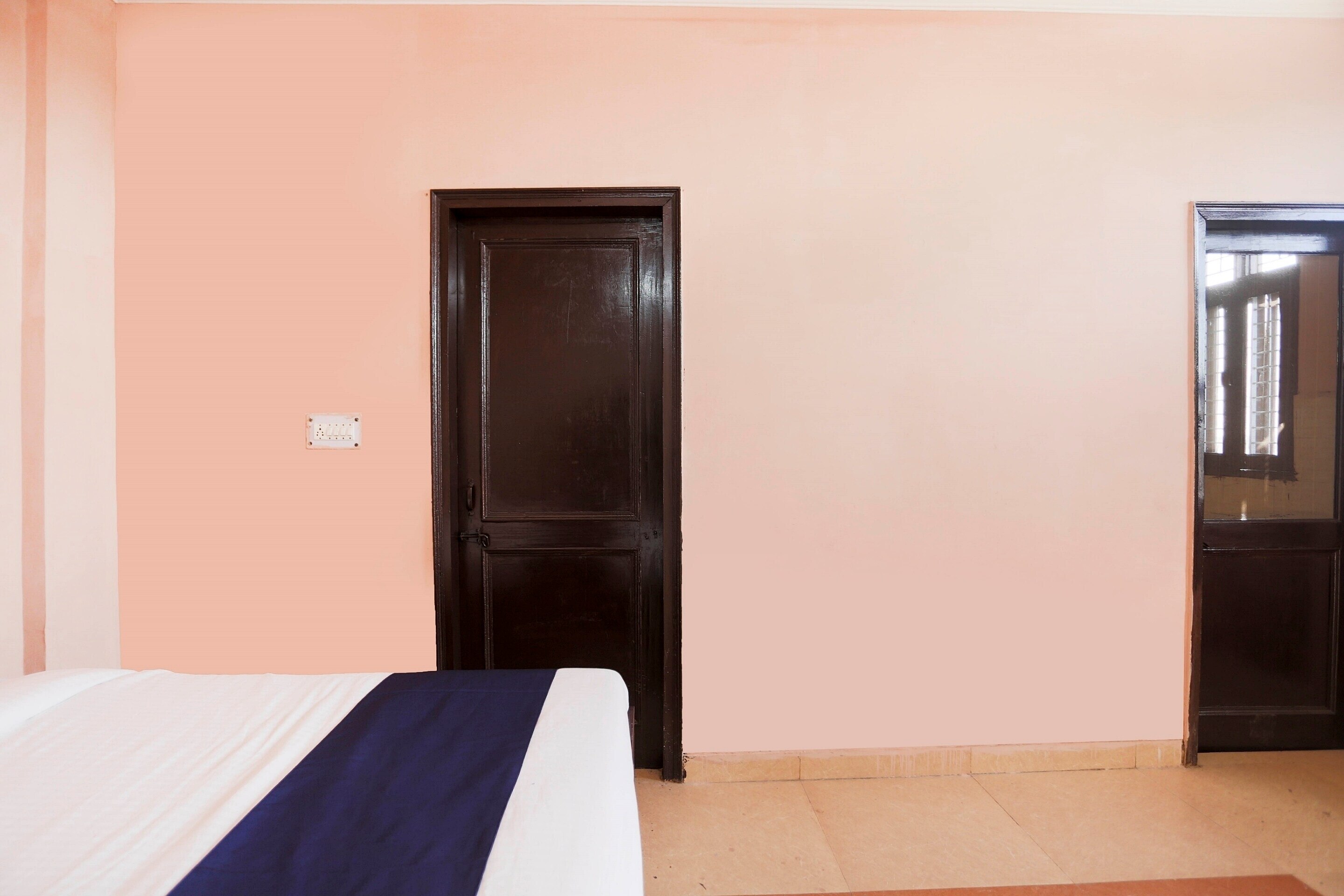 Hotel O Sanrac Residency - Tap to explore photos