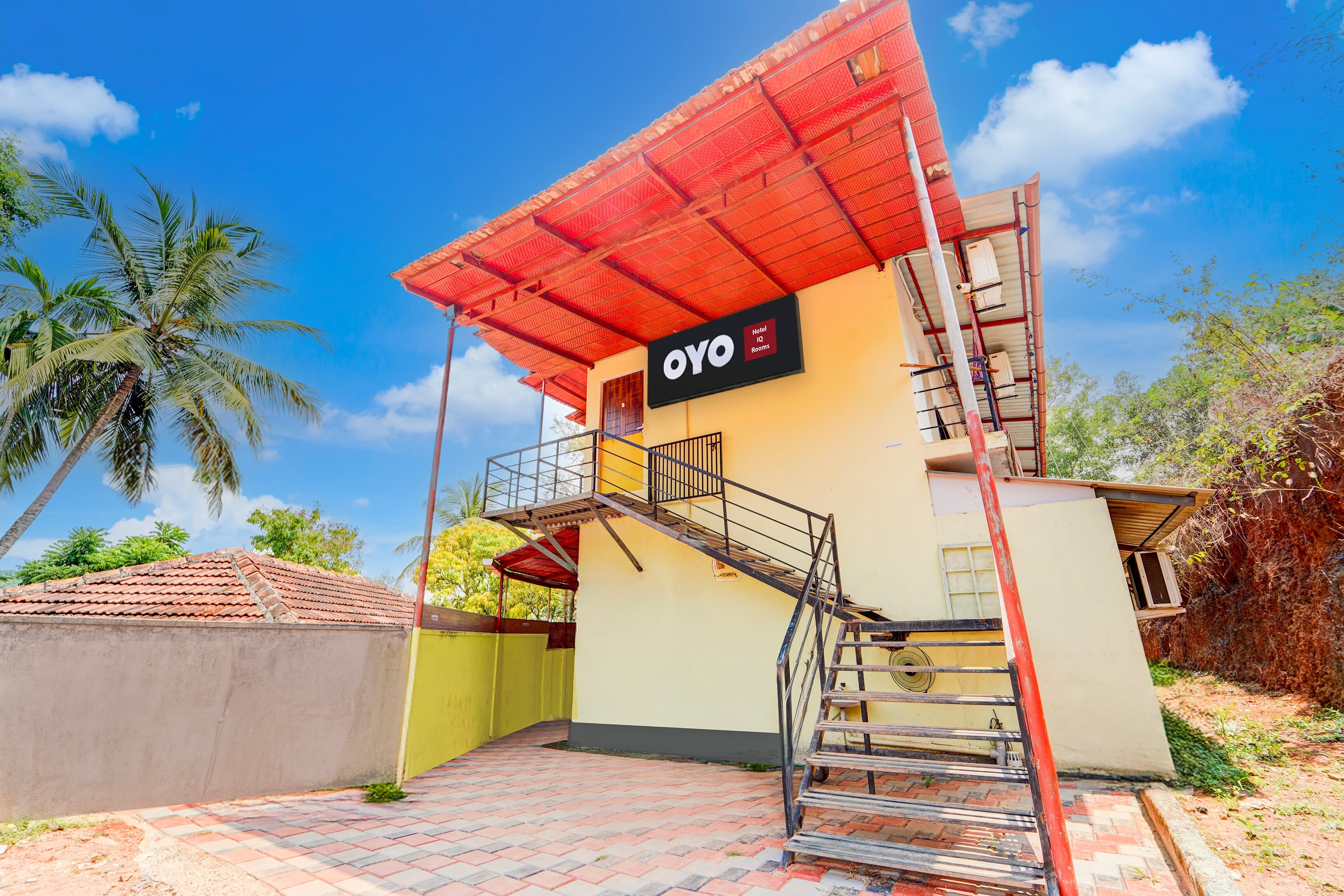 Hotel O IQ Rooms - Tap to explore photos