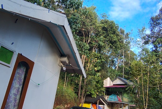 Green portico tent and hut stay