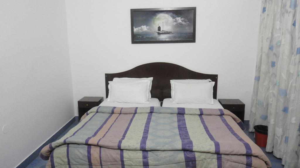 new malabar guest house - Tap to explore photos