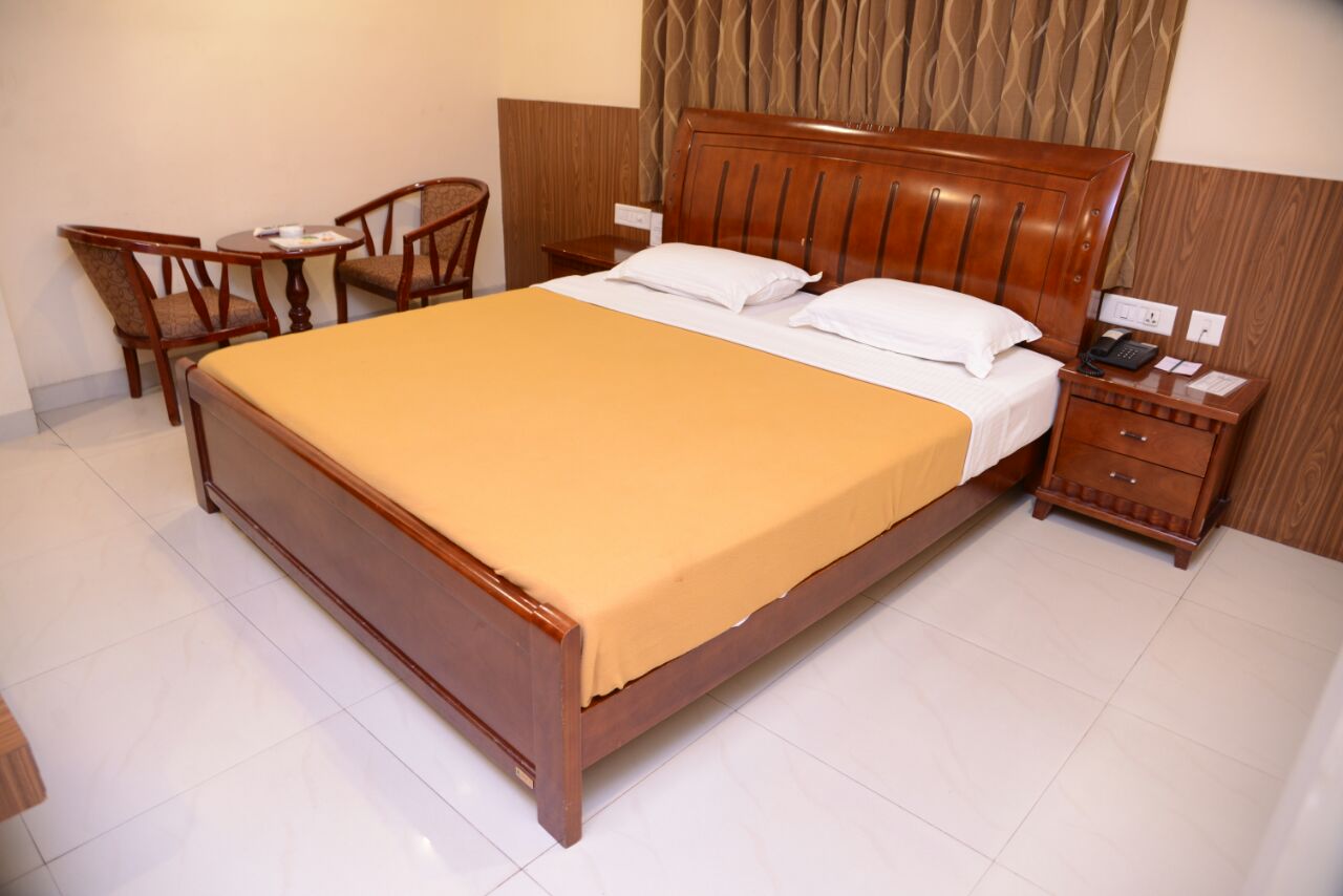 Hotel Aarti International - Tap to explore photos