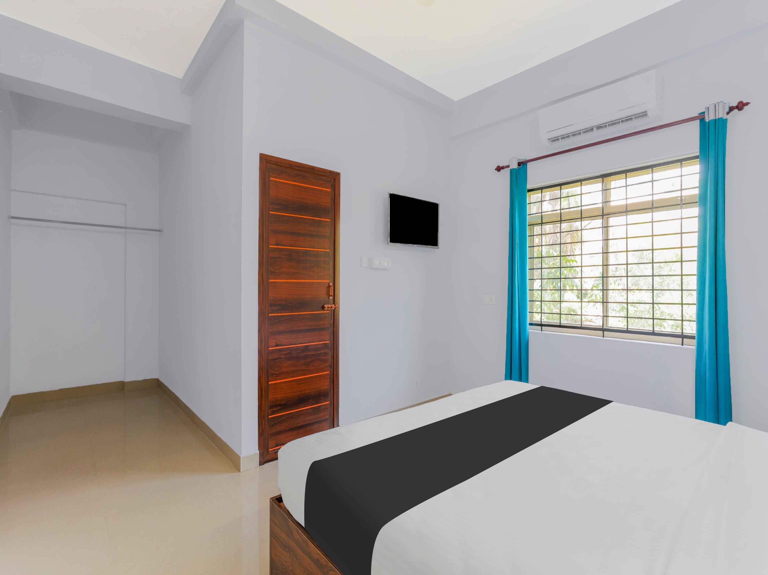 Hotel O NILA TOURIST HOME - Tap to explore photos
