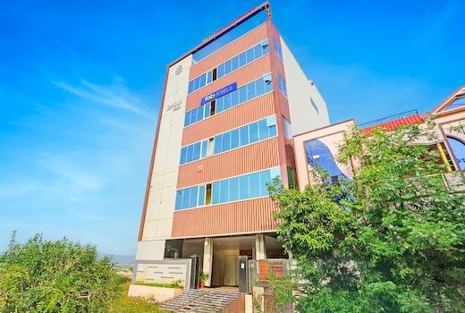 FabHotel Dharani Grand - Nr. Mamata Medical College