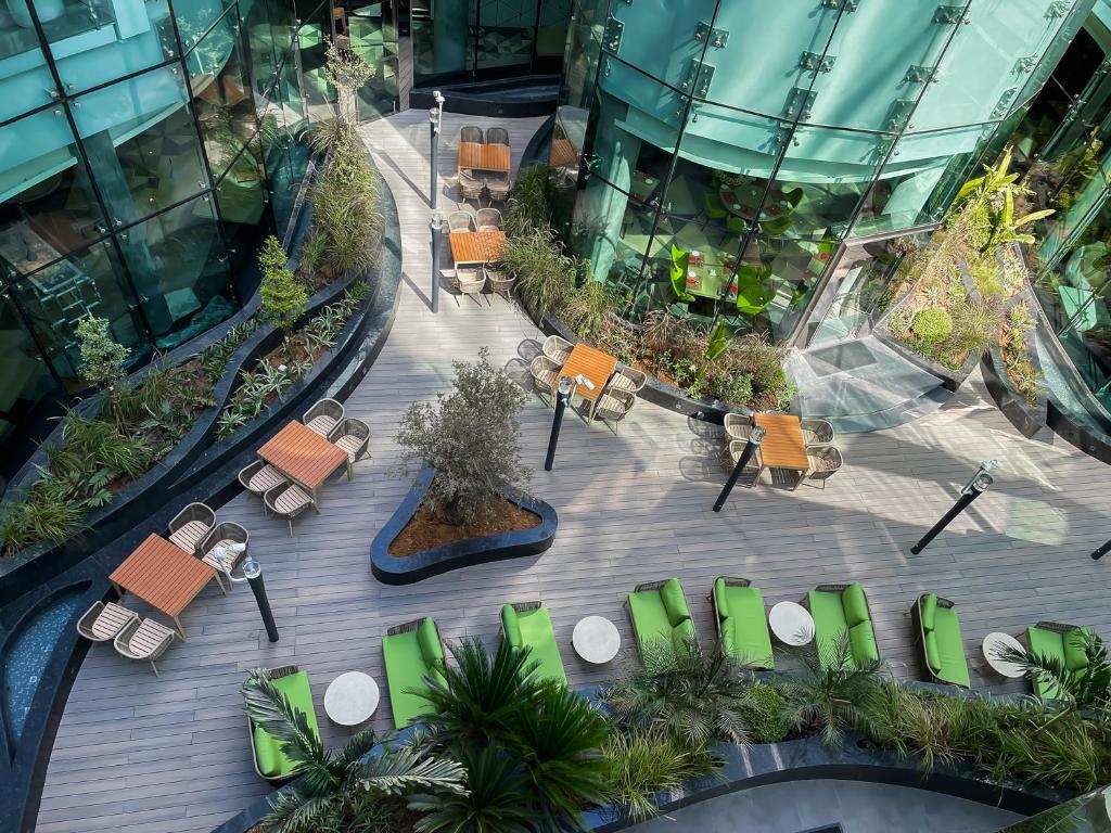 Al Khoory Sky Garden Hotel - Tap to explore photos