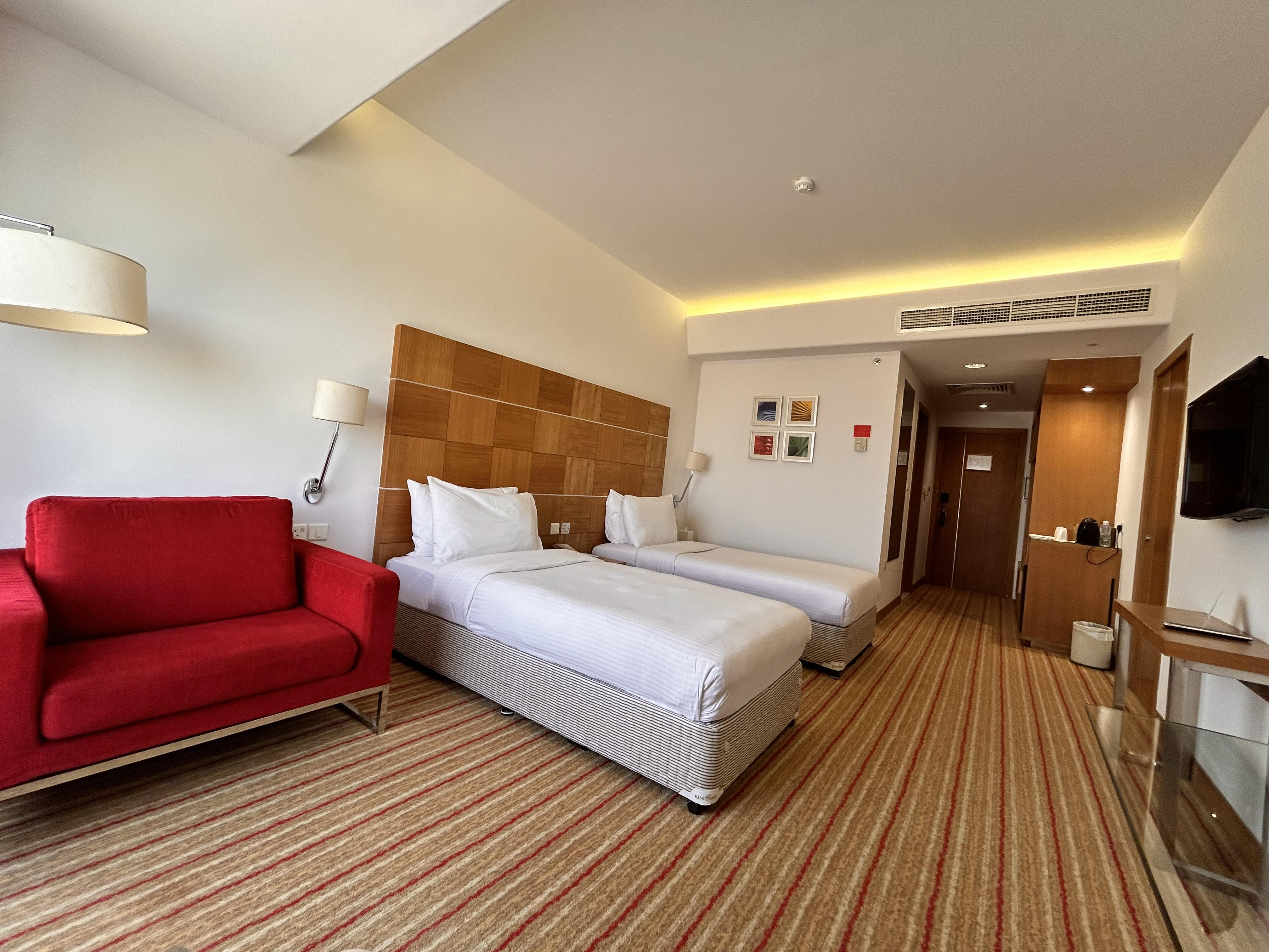 Golden Tulip Muscat - Tap to explore photos