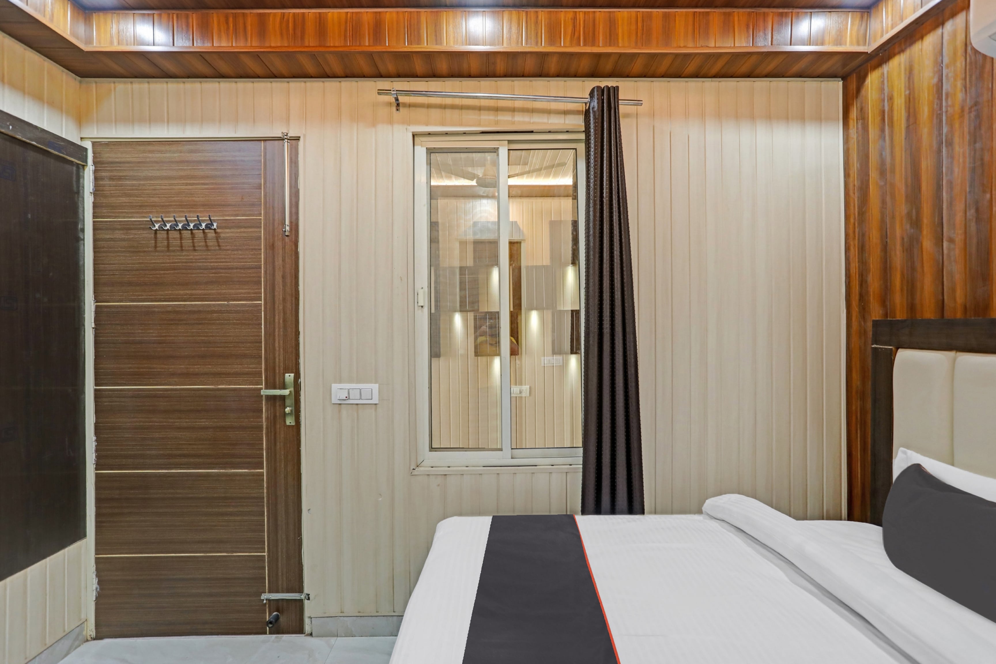 Hotel O JMS Residency - Tap to explore photos