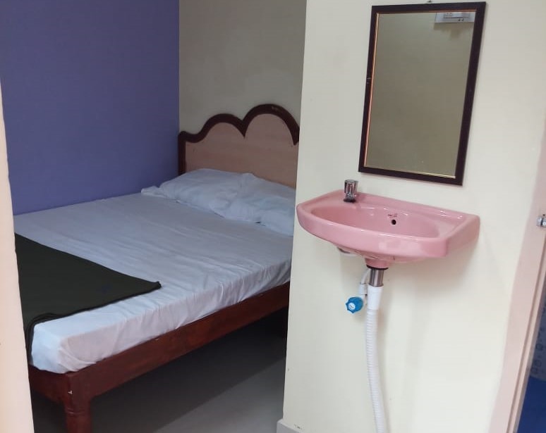 Sai Srinivasam AC Dormitory And AC Lodge - Tap to explore photos