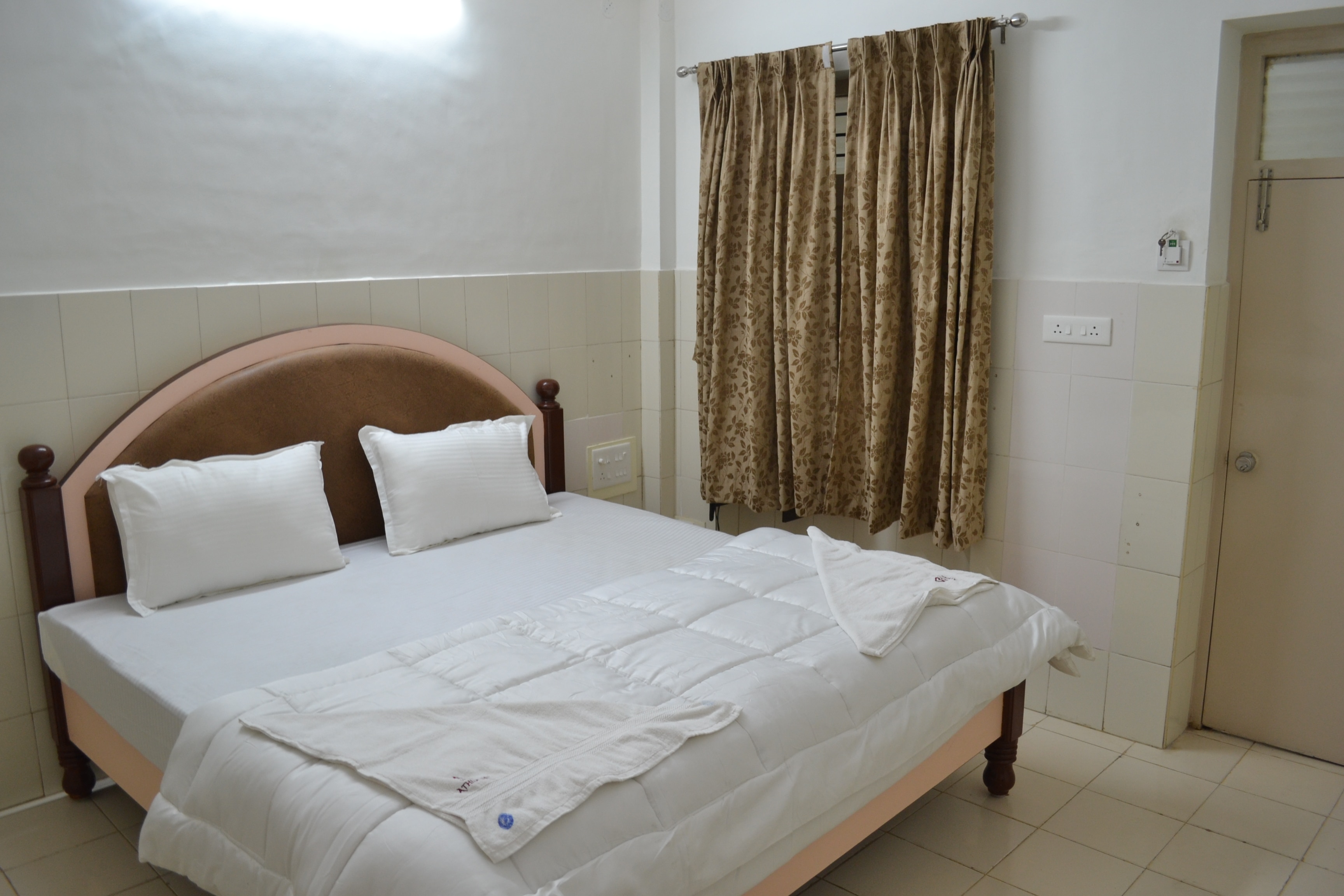HOTEL ATHIDHI INN - Tap to explore photos
