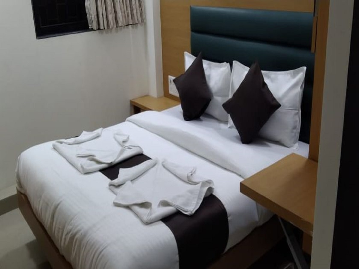 Hotel Sai Grand Residency - Tap to explore photos