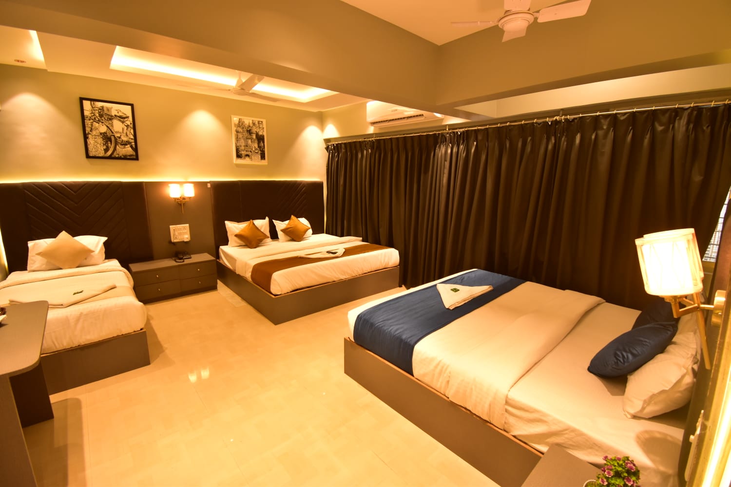 Hotel Dhanvantari - Tap to explore photos