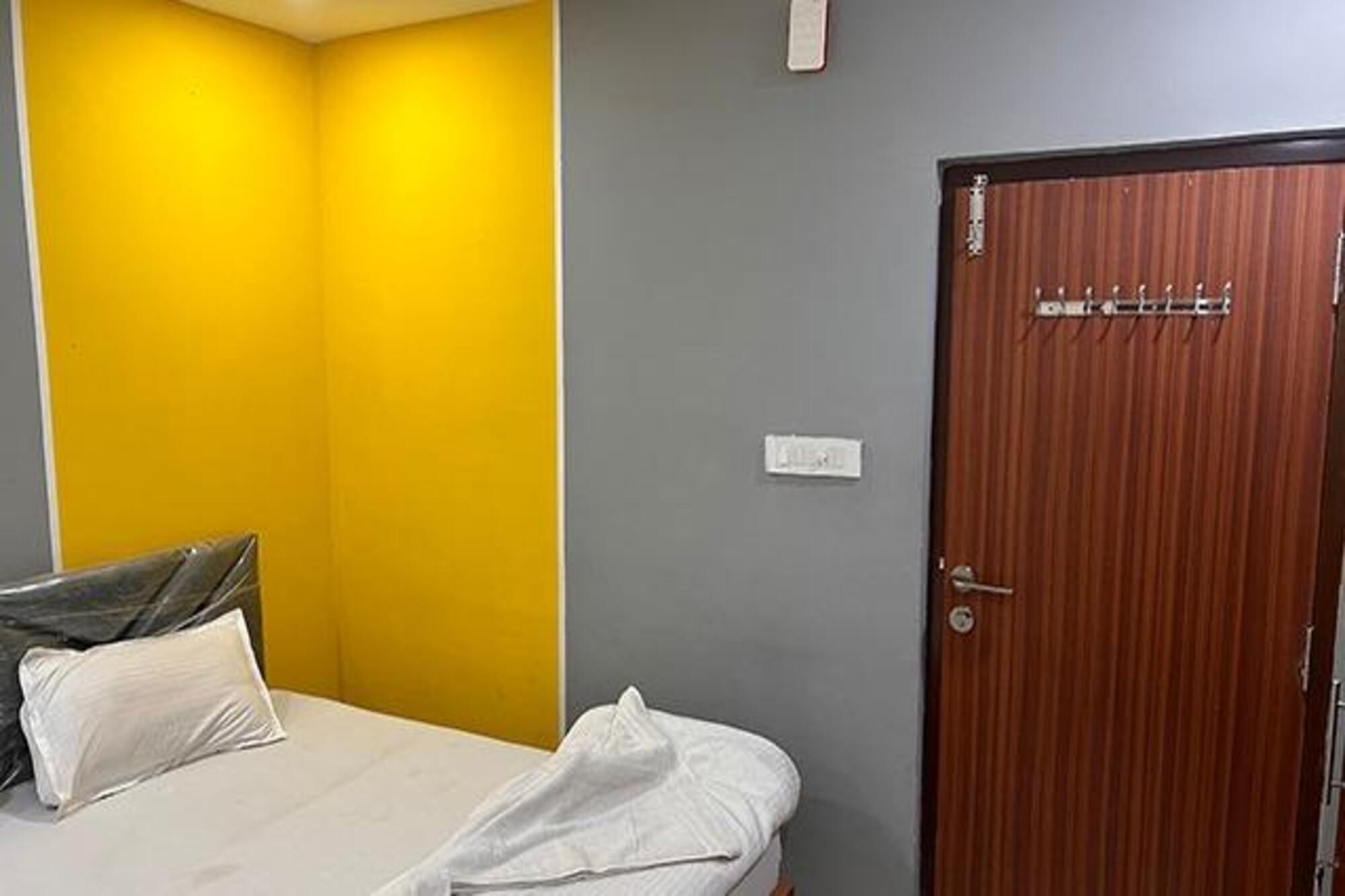 FabHotel R3 Atmos - Tap to explore photos