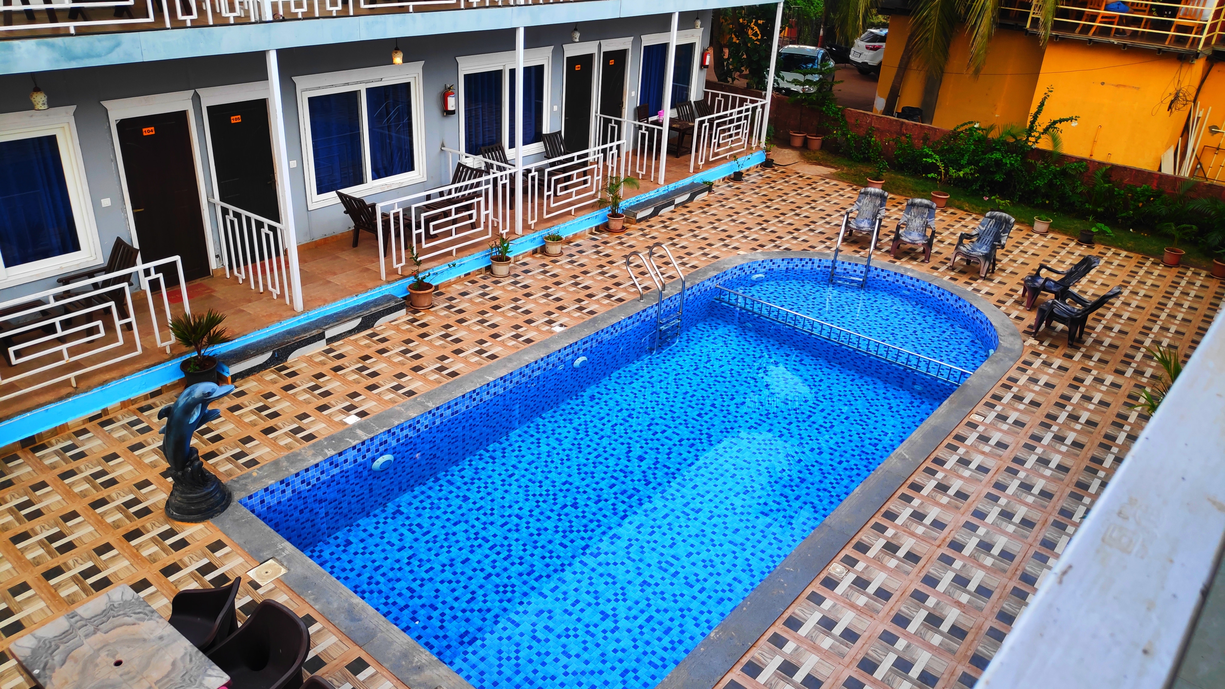 Royal Tulip Beach Cottages | Restaurant & Pool - Tap to explore photos
