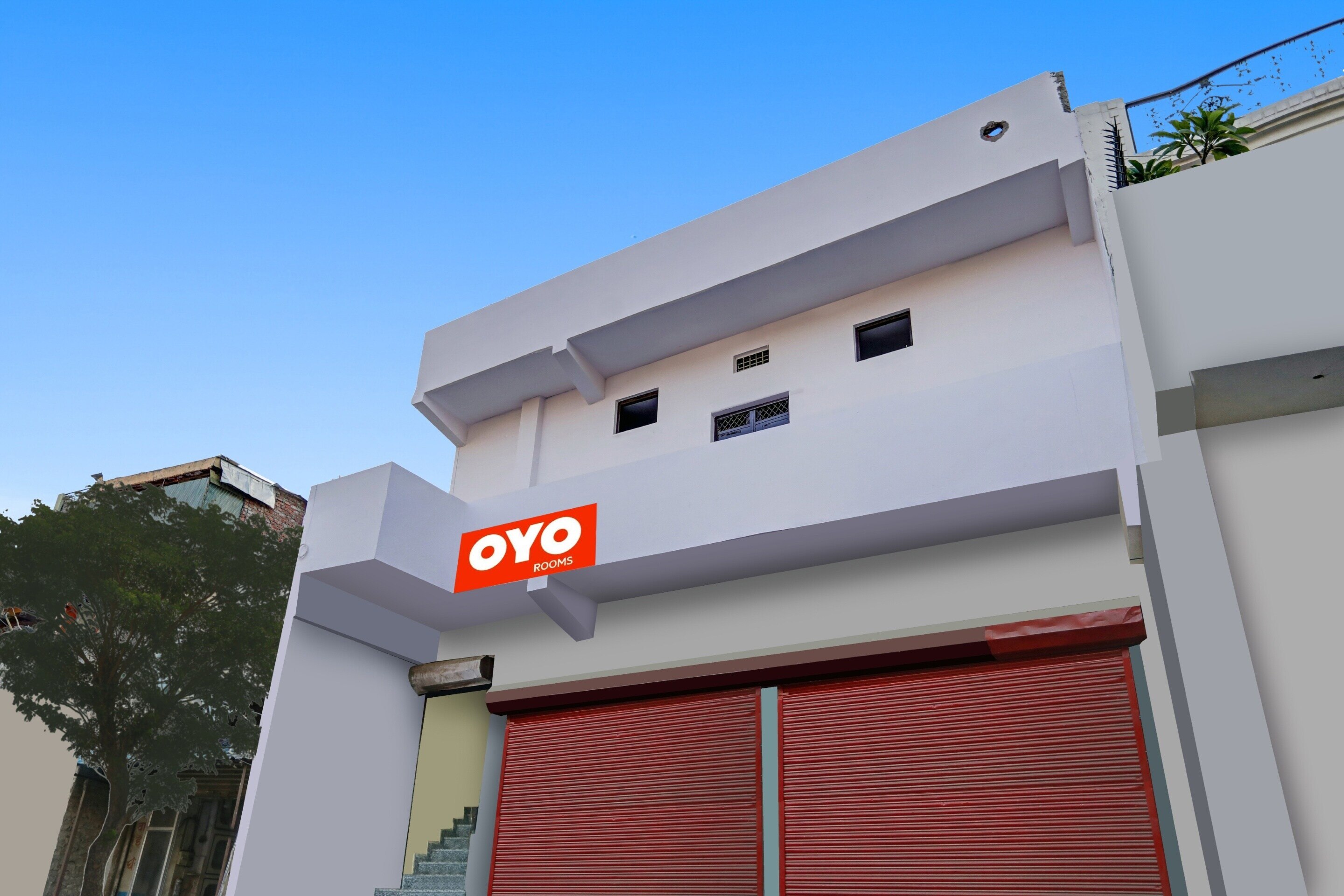 OYO 93116 Classic Guest House - Tap to explore photos