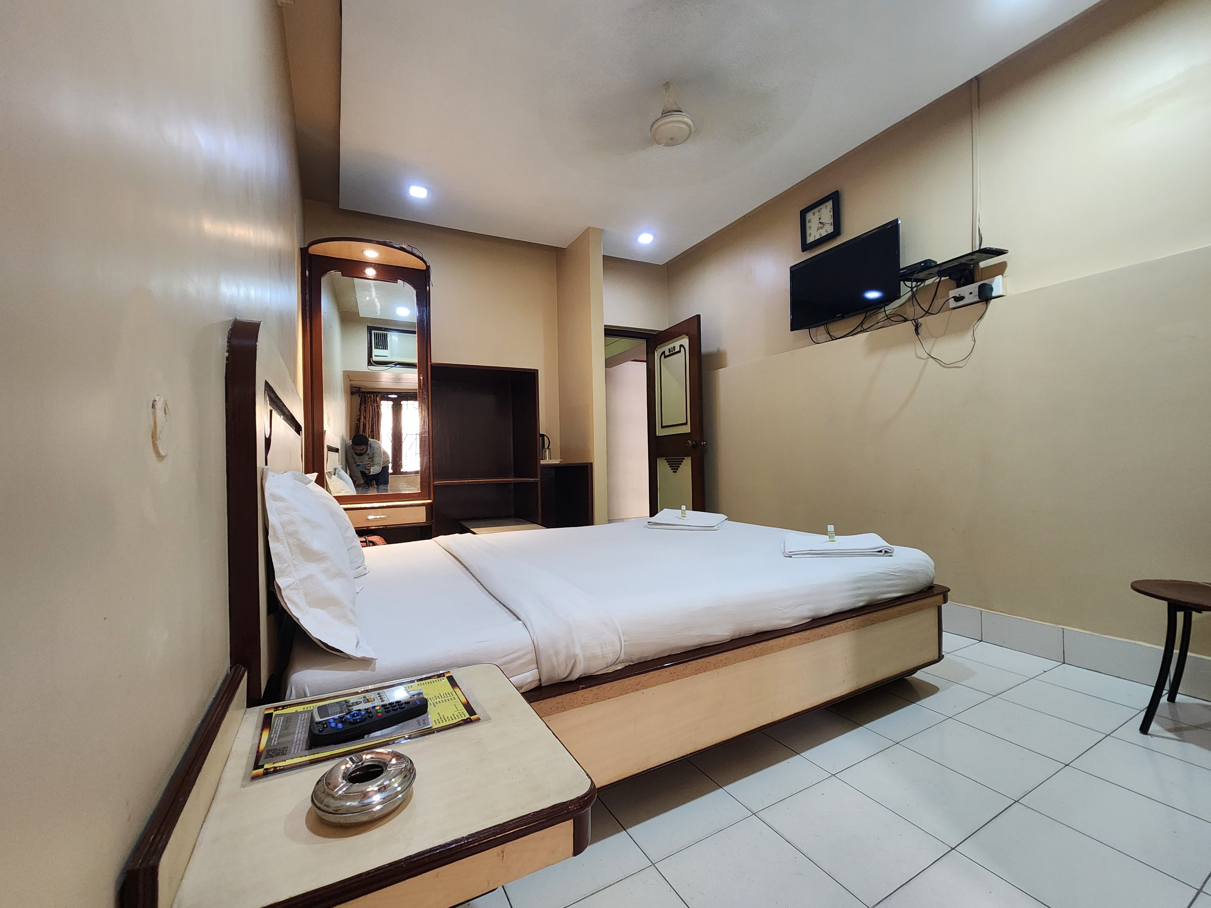 Hotel Pushpak International - Tap to explore photos