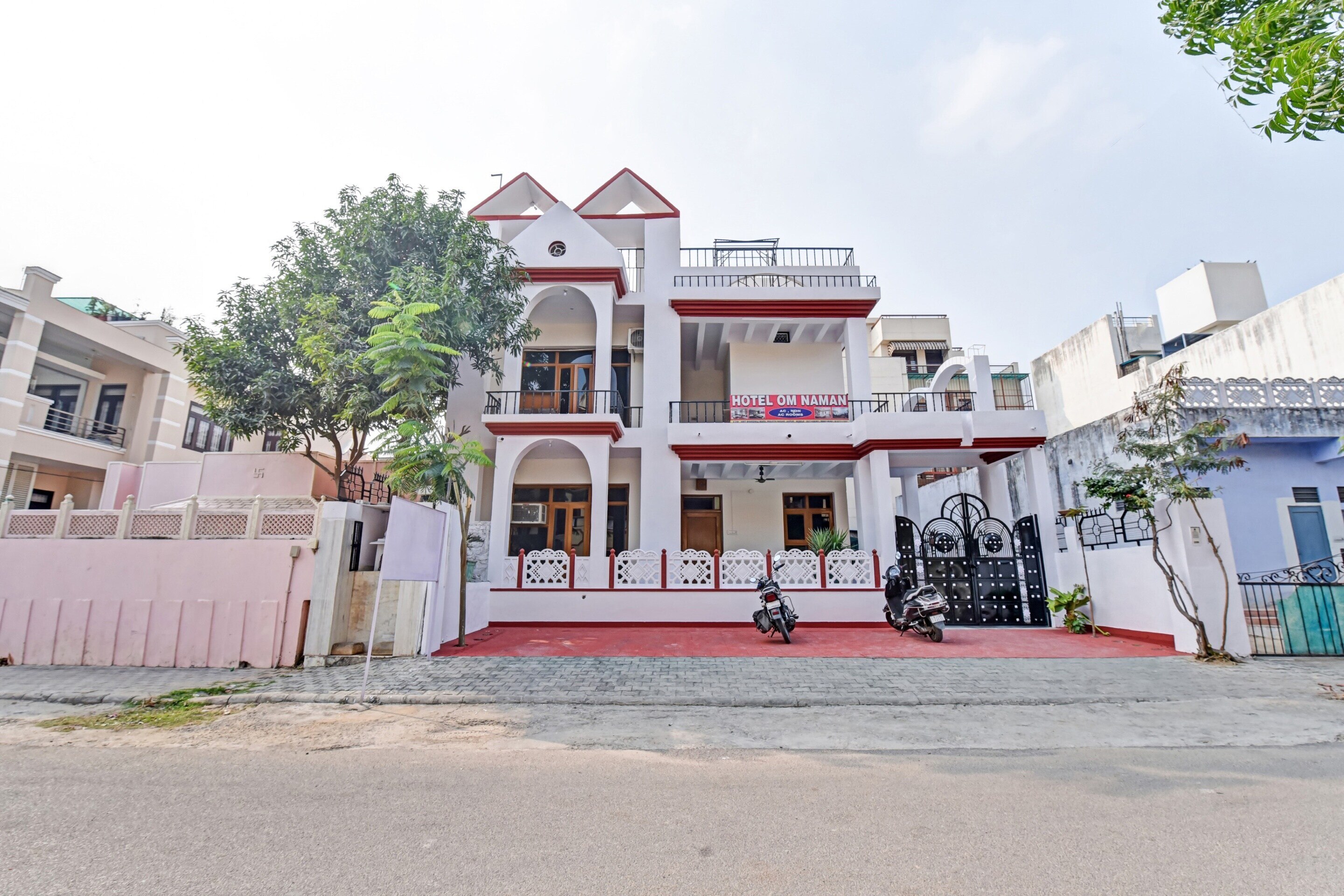 Hotel O Om Naman - Tap to explore photos