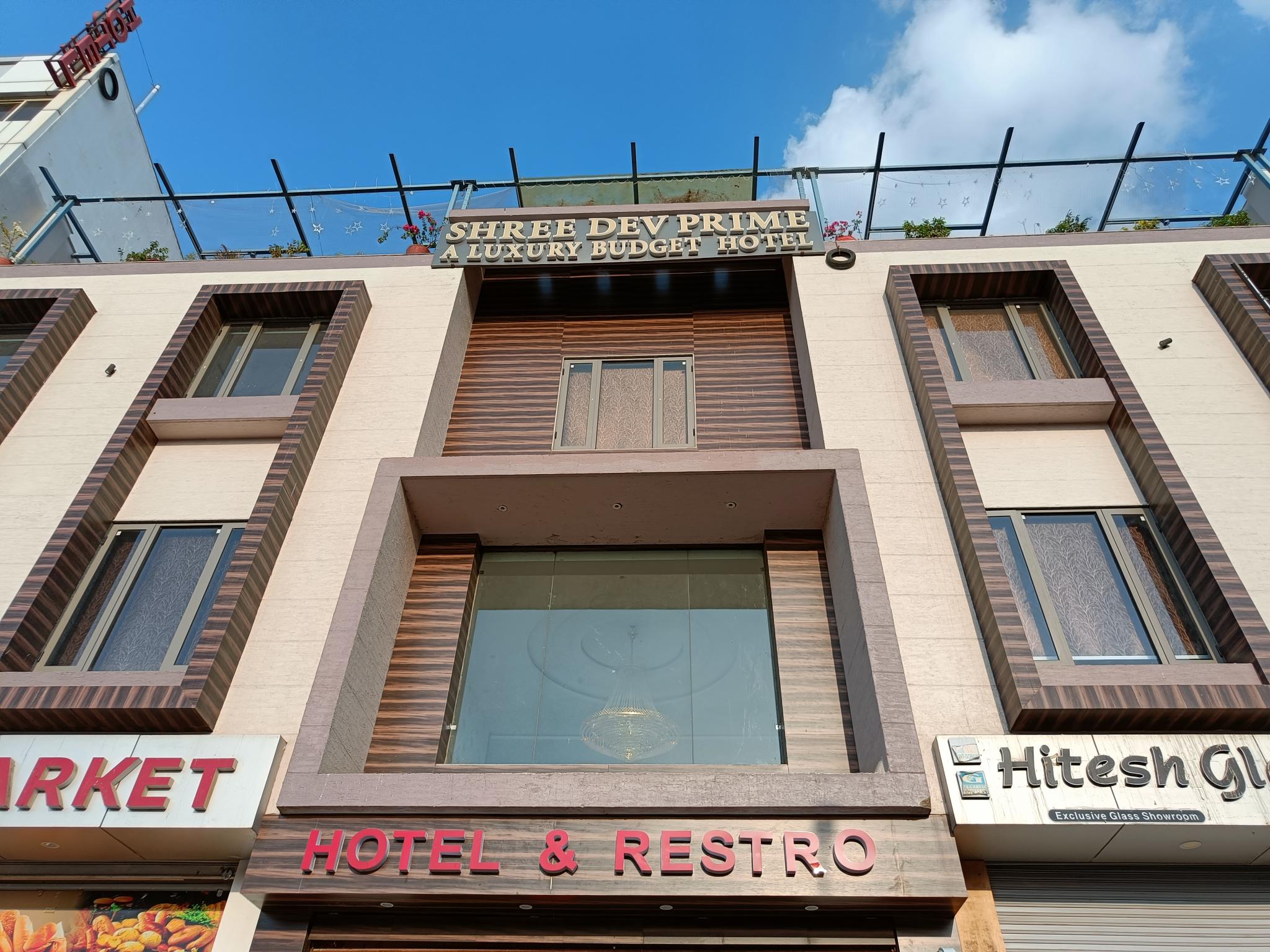 Hotel Shree Dev Prime - Tap to explore photos