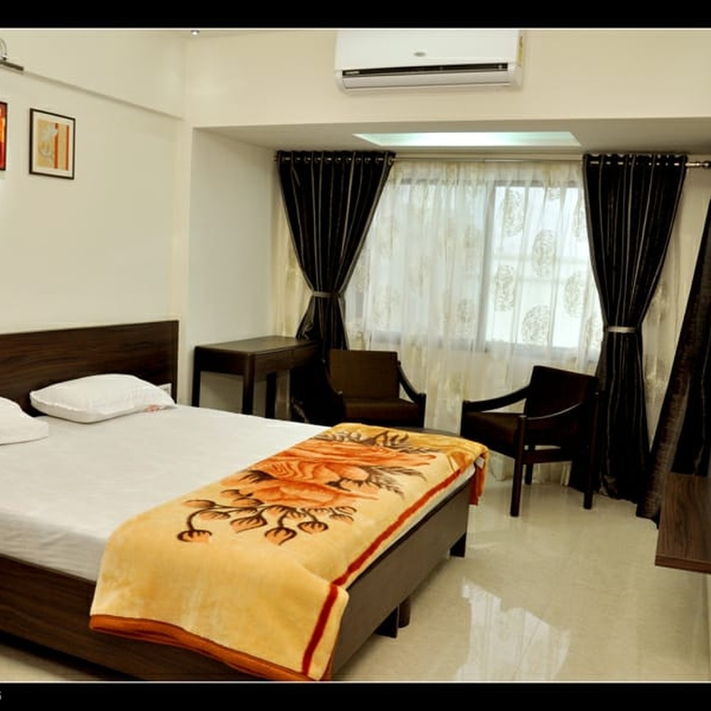 Hotel Shree Abhishek - Tap to explore photos